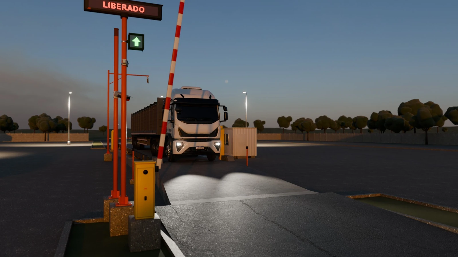 Barrera de salida abierta y display con LIBERADO mientras la carreta deja la báscula